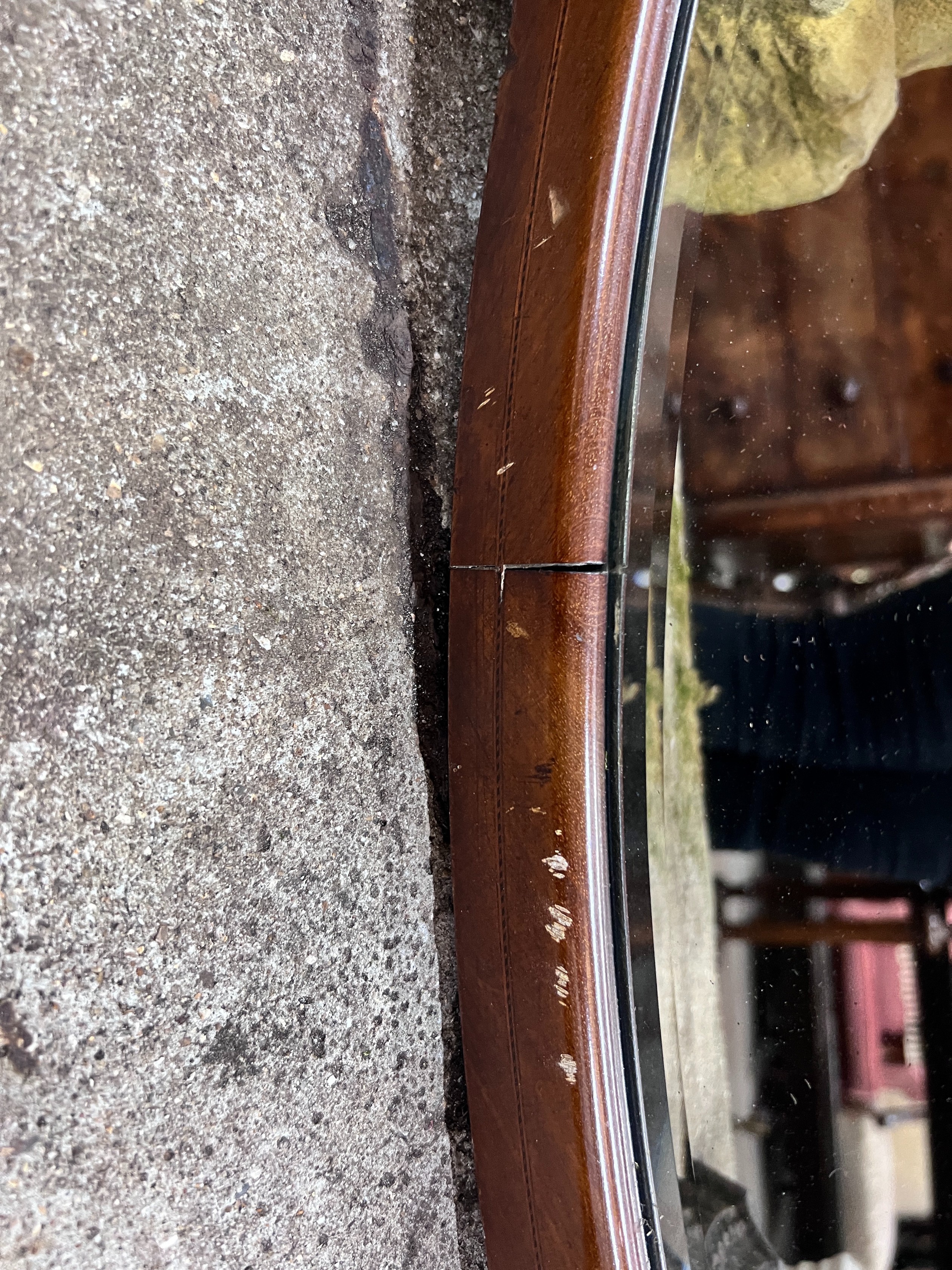 An Edwardian strung mahogany wall mirror, width 90cm, height 65cm